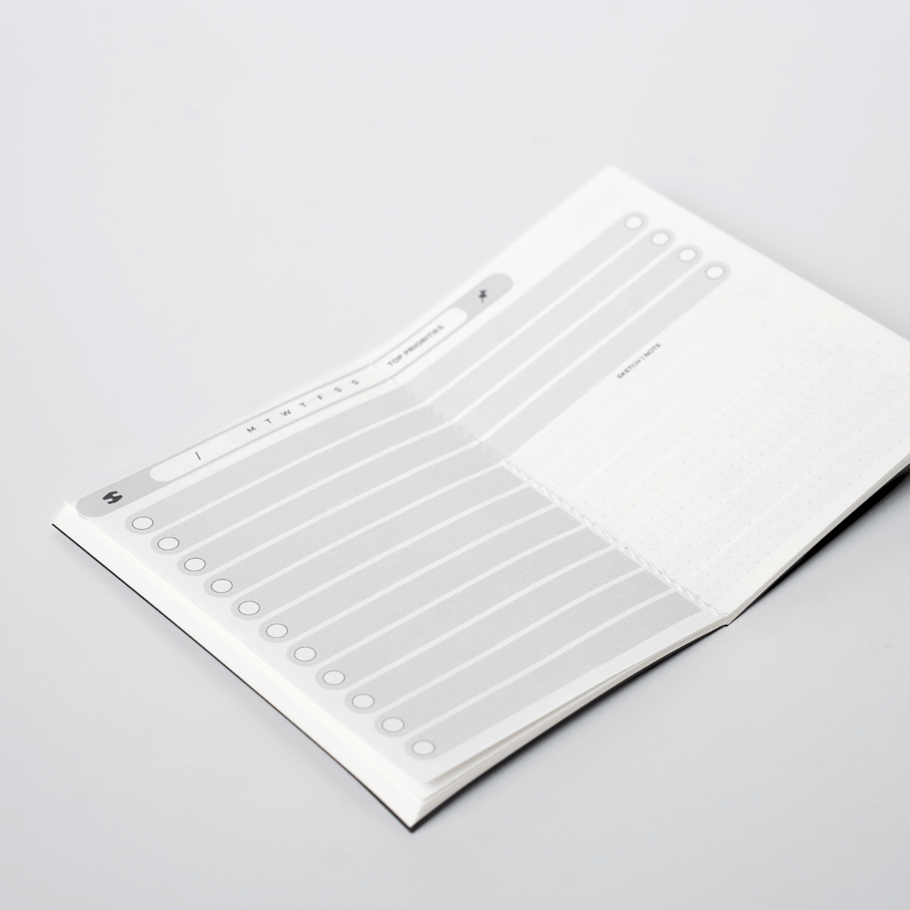 Day Master | Undated Daily Planner with Monthly Stickers