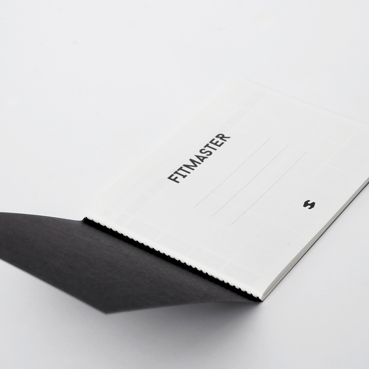 Fitmaster notebook opened to its name page