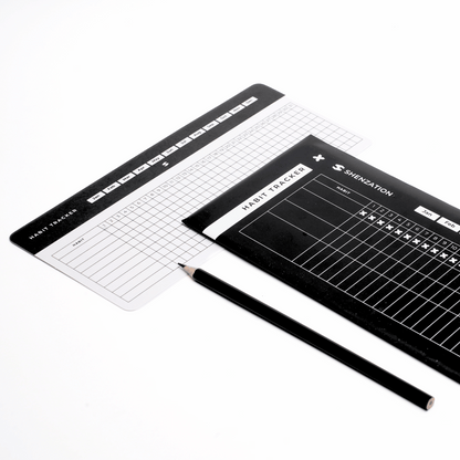 Black and white Habit Tracker Cards arranged with a pencil